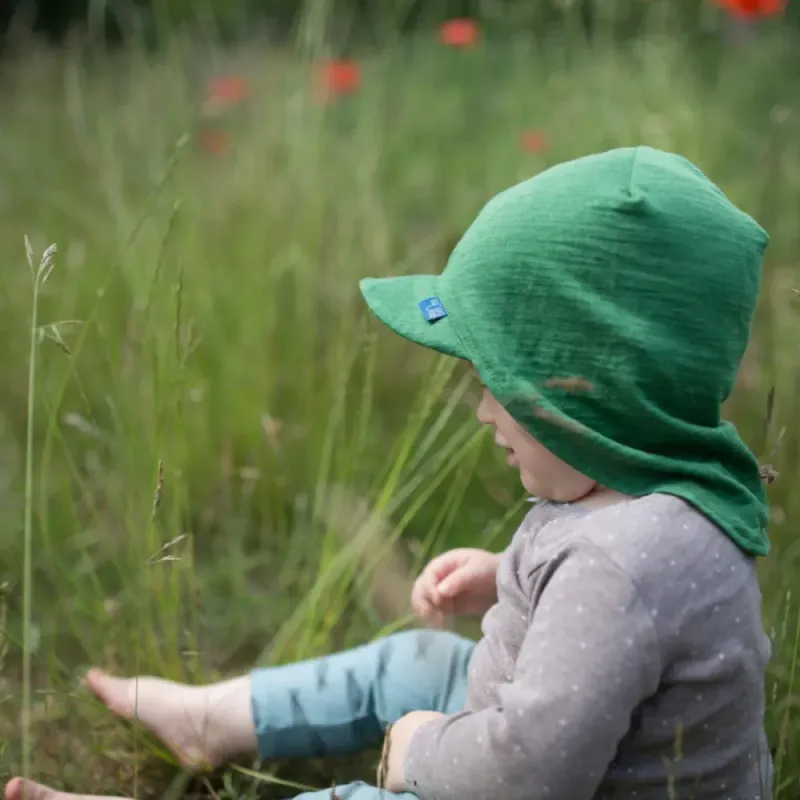 Glückskind solhatt i ull/silke grønn